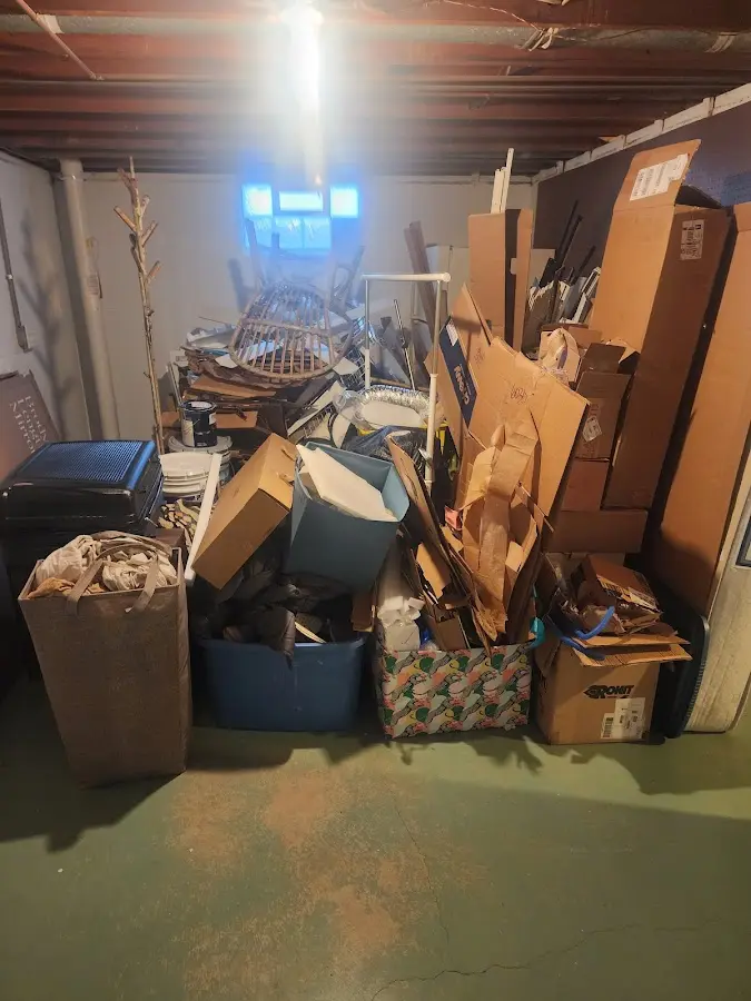 Roll-off dumpster container at job site for 15 Yard Dumpster Rental in Redan